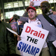 Trump supporters march in New York on election night. Photo via AP.